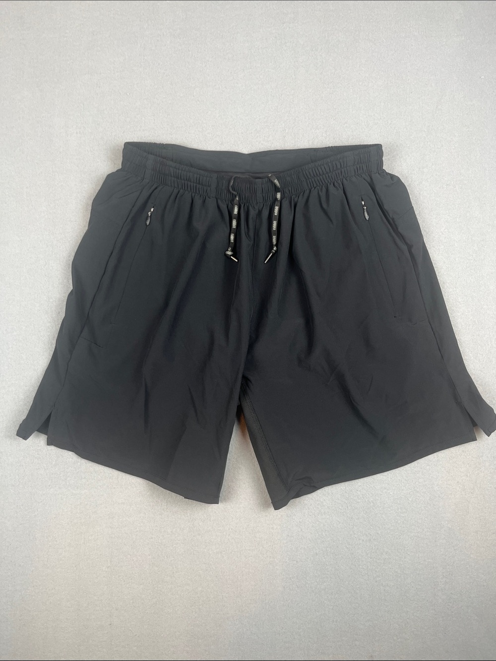 Men's Rabbit Black Running Drawstring Shorts with Zip Pockets 7”
Size: Medium